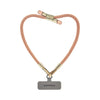 Peach Orange BlingBling wristlet strap highlighted with Tiny Bulb reflectors