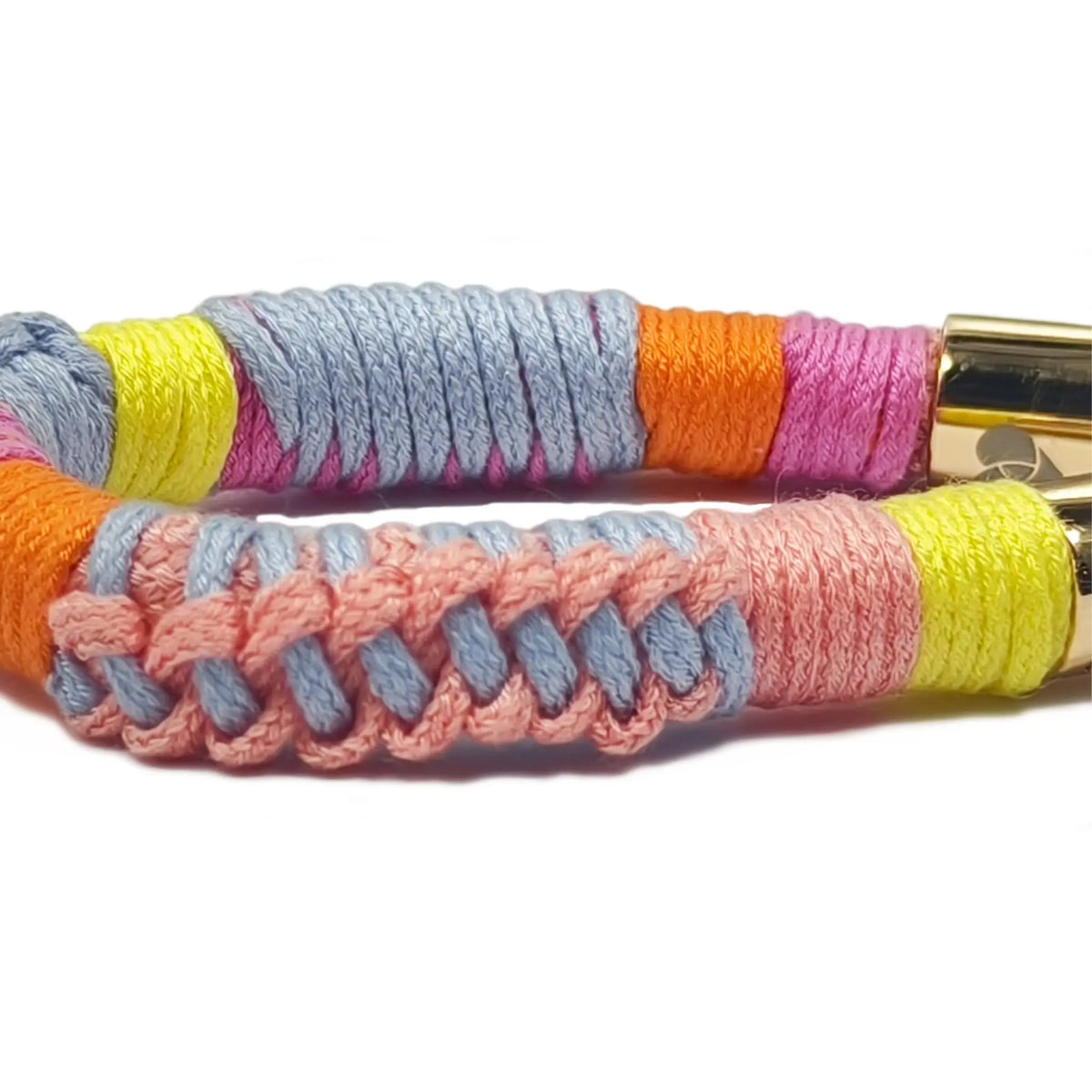 Close-up view showing the fine texture and tight braiding of the soft TENCEL™ cord in pastel dream color.