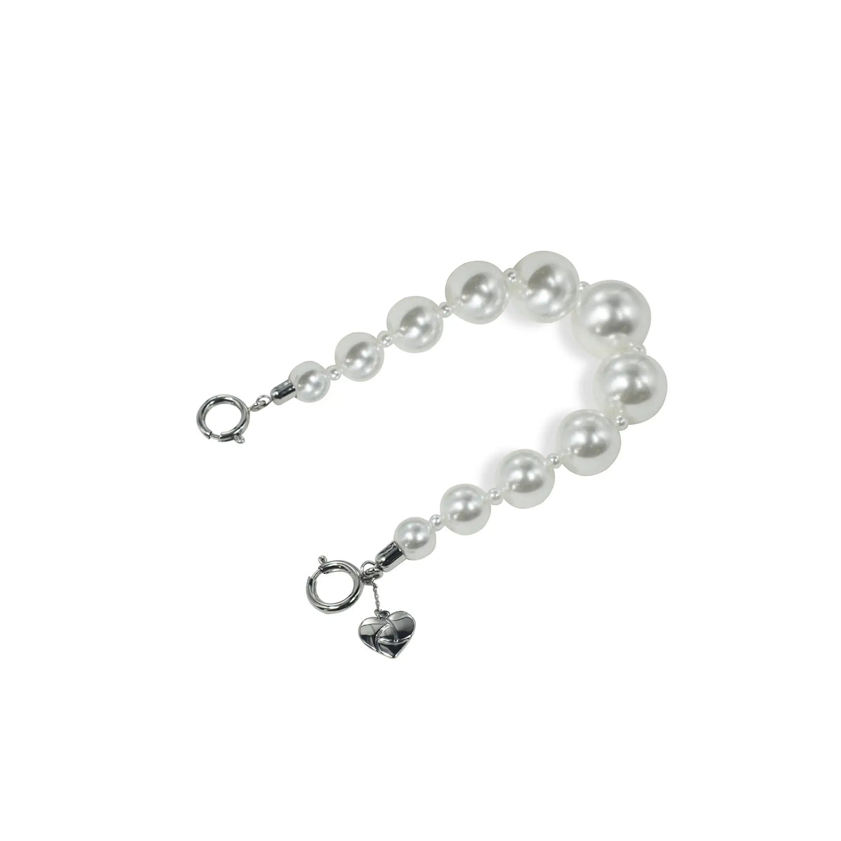 Side view of small pearl charm strap, showcasing compact design for easy use.