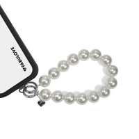 Wrist strap fixed to phone case with strap card, suitable for phone carrying.