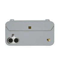 Stylebase Etoupe Grey iPhone 16 Case with Golden Hardware, showing camera holes, strap loops, and jewel slot.