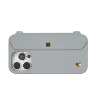 iPhone 16 Pro Max fashion case in Etoupe Grey with gold accents, featuring a built-in mini wallet compartment.